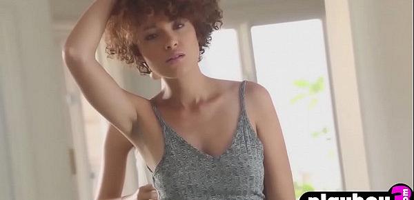 Curly black model shows her sexy body after striptease